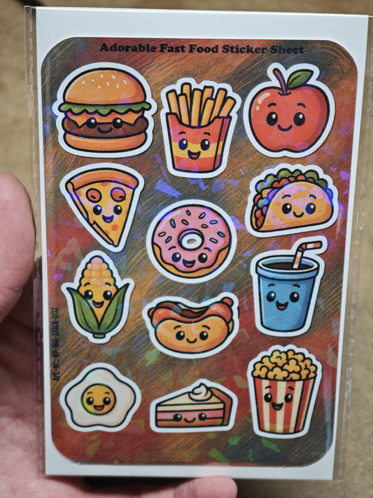 Eine Hand hält den New Plastics Adorable Fast Food Sticker Sheet mit 12 Stickern (ca. DIN A6) – mit süßen, lächelnden Fast-Food-Motiven, ideal für DIY-Projekte und kreative Sticker-Sammlungen.