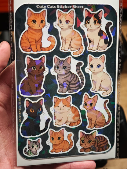 Eine Hand hält das Cute Cats Sticker Sheet mit 12 Stickern ca. DIN A6 von New Plastics, zeigt zwölf farbenfrohe Katzenmotive – ideal für DIY-Projekte.
